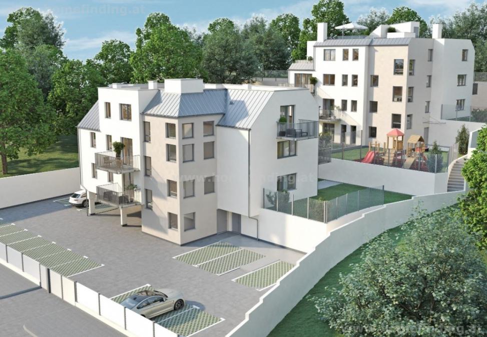 2 houses with 12 apartments + open air parking spaces